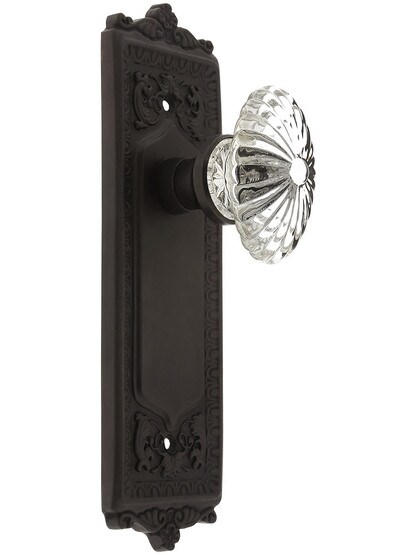 Egg and Dart Plate with Oval Fluted Crystal Knob without Keyhole in Oil Rubbed Bronze.